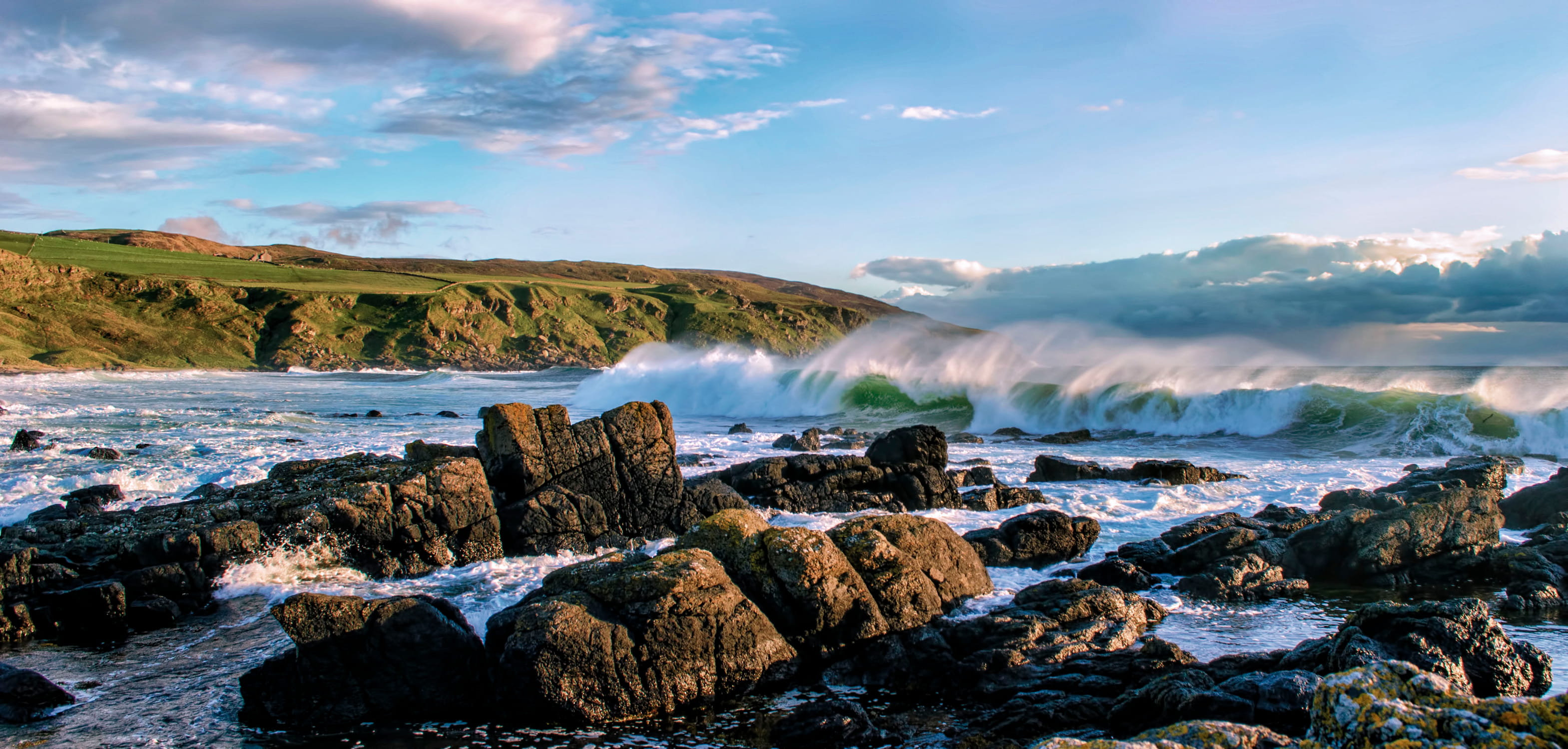 waves breaking against the rocks at Gauldrons Bay